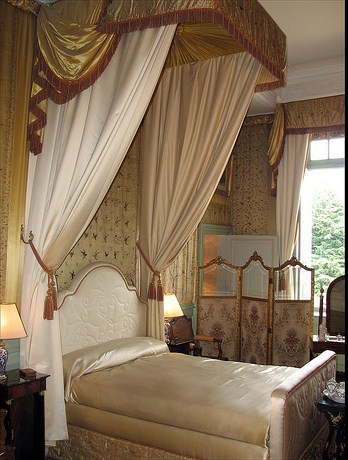 canopy bed in gold satin
