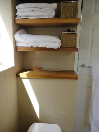 bathroom after toilet storage wood floating shelf
